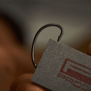 Piedra para afilar anzuelos